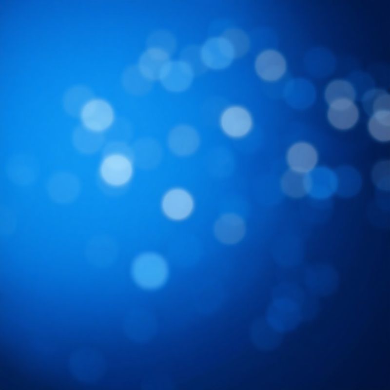 Apstraktni indigo gradijent s mekim točkama svjetla koje sugeriraju digitalnu povezanost